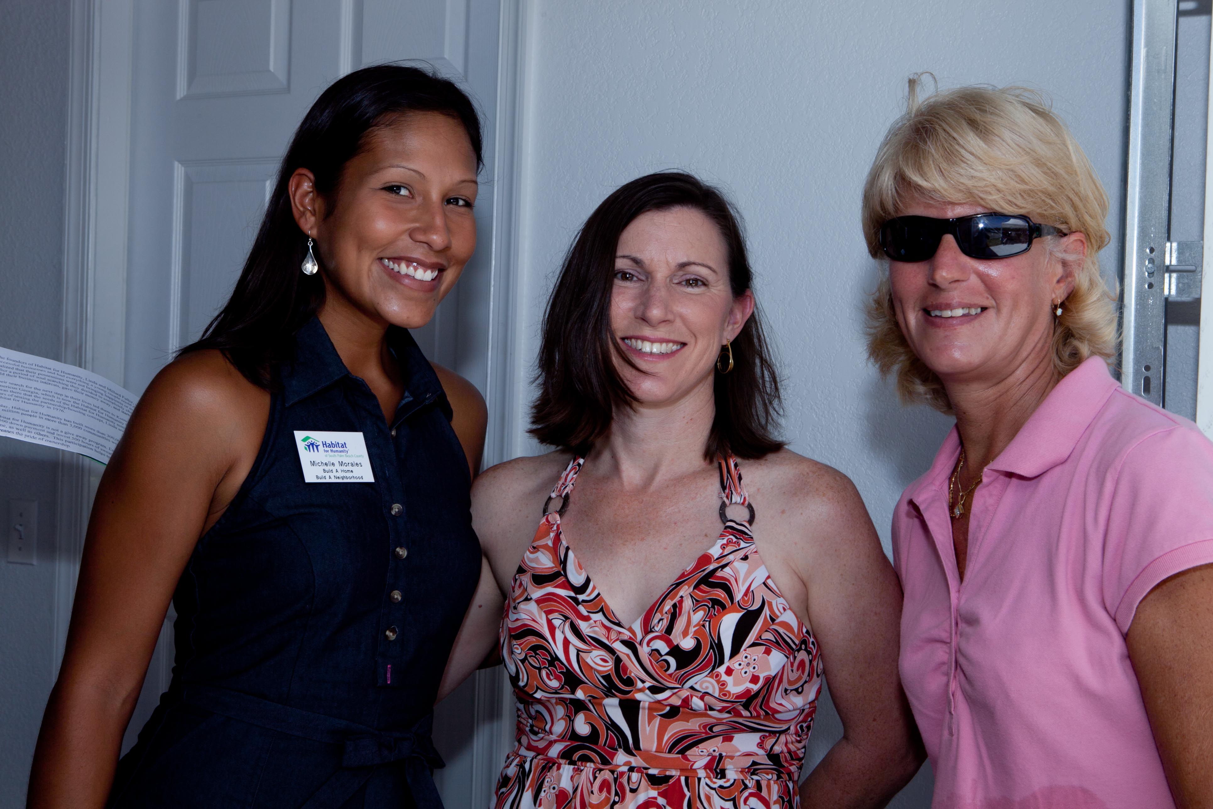 Habitat Volunteer Coorindator Michelle Morales, left, with board member Diana Hileman and Construction Supervisor Helen Bass.