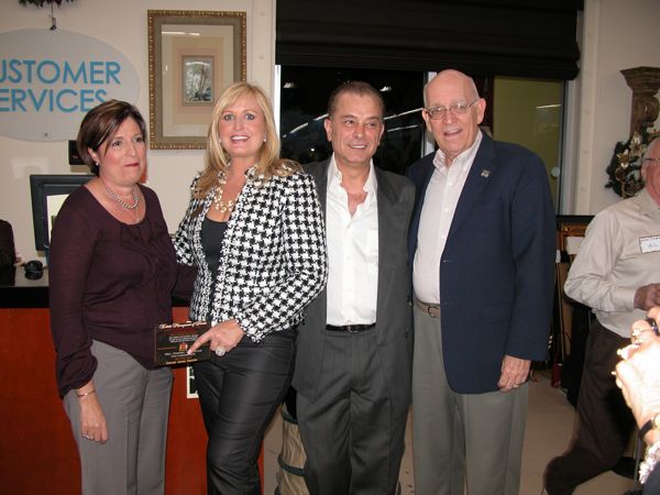 Beth Johnston of the Delray Chamber, with Candace Rojas of Estate Management of Florida, William Likas of Home Fabrics & Decor and Bill Wood of the Delray Chamber. Both Estate Management and Home Decor were co-sponsors of the card exchange. 