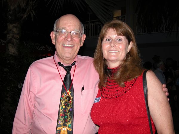 Delray Chamber President Bill Wood, decked out in his holiday-appropriate tie, with Kim Tisdale of the World Affairs Council of the Florida Palm Beaches.