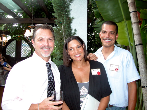 Keith Hoersch of Meridian Insurance, left, with Sandra Canning and Nigel Mann of Capital Media Network. 