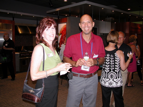 Regina O'Leary of House2Home Redesign with Mike Borsos of Van's Carpet Care.