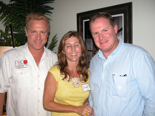 Adam P. Kogan of Championship Realty, left, with Danielle Iagrossi of Avenue Pilates and Tony Keller of PSI Equipment Inc. 