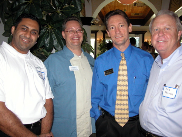 Moe Almutawa of Fast Teks, left, with Steve Shelby of FarVison Networks, Matt Swanson of the Swanson Real Estate Team and Fred Fetzer, Delray Beach city commissioner. 