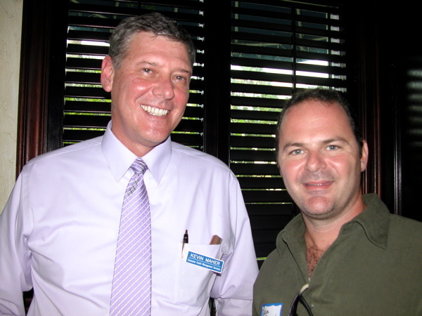 Kevin Maher, director of community education at Consumer Credit Management Services Inc., left, with Jason Busch, a project manager with HR Compensation Consultants.