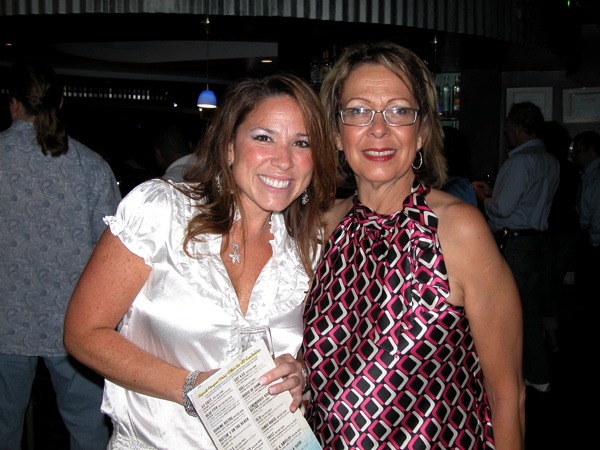 Karla Portocarrero of Hospira Worldwide, left, with Maria Gaitan of Consumer Credit Management Services Inc.