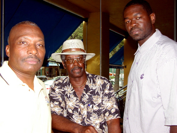 Ronnie McNair of YTB Travel network, left, with Ben Frazier and Fan Da Man.