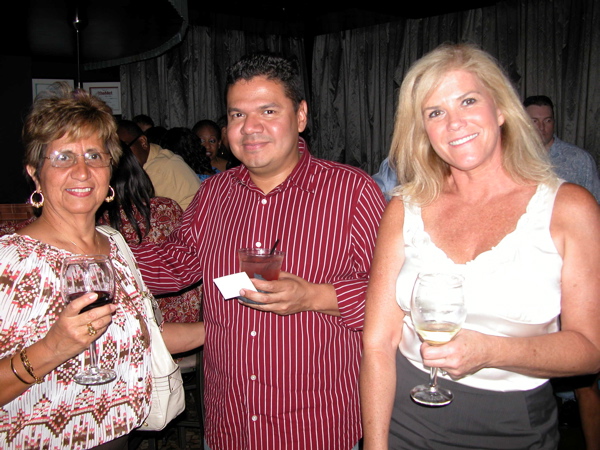 Beatriz Ramirez, of Beatriz Cilantro Salsa Corp., left, with Edwin Murillo of the Florida Women's Business Center and Christeen Cubillos of Temps Plus.