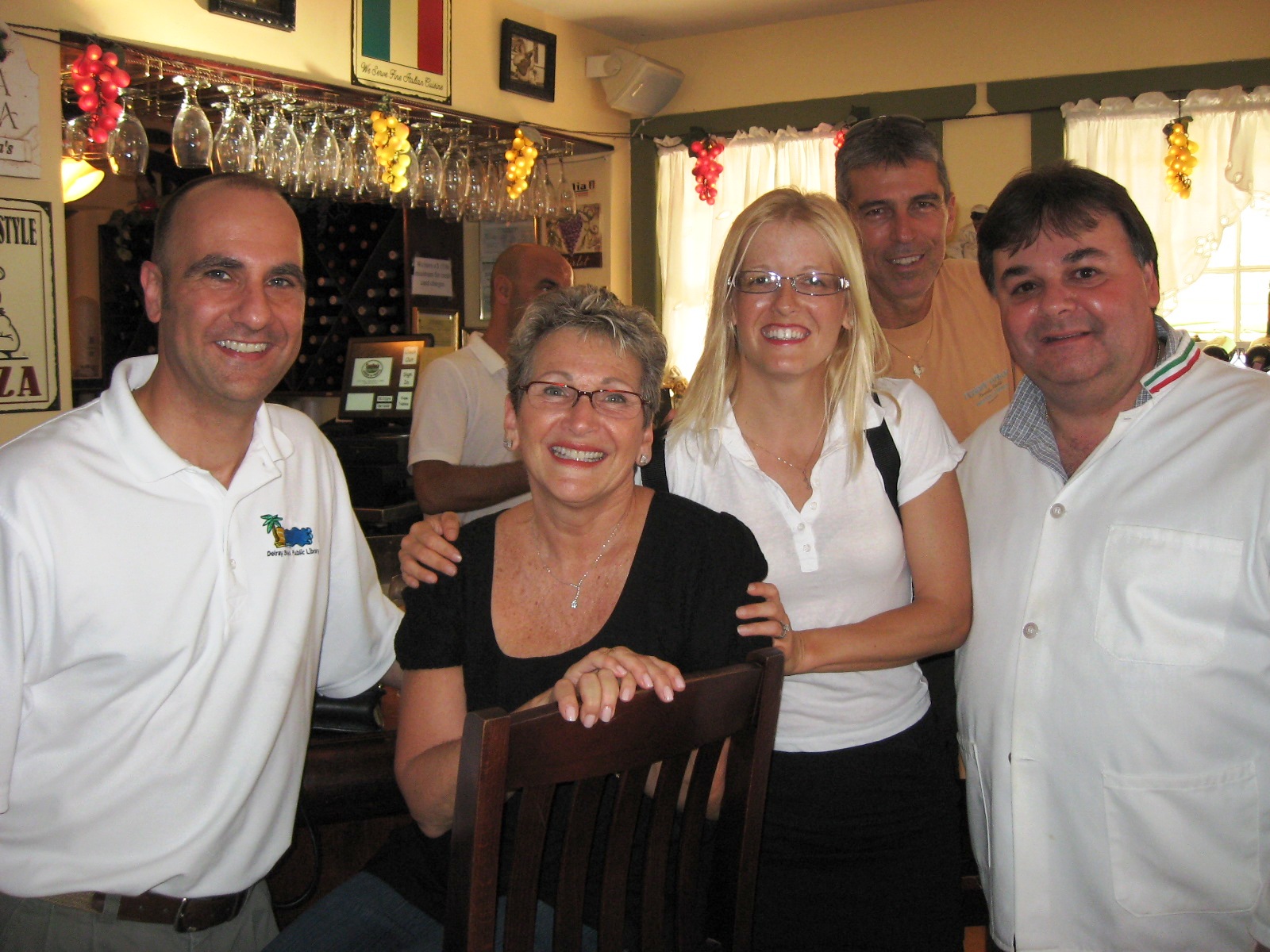 Library Director Alan Kornblau, left, with Bonnie Stelzer, the library community relations director, Rachel Van Ness, John Czech and Jeff Perlman.