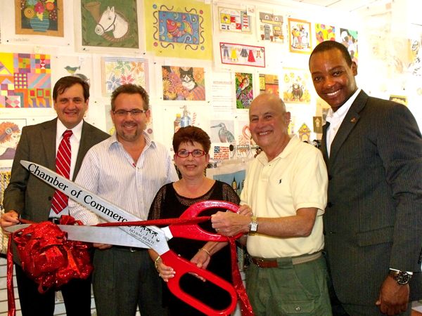 Stitches by the Sea celebrates its grand opening. From left, Delray Beach Chamber of Commerce President Mike Malone with Franciso Perez-Azua of the chamber's board of directors, owners Judi and Dick Alweil and Delray Beach city Commissioner Al Jacquet. 