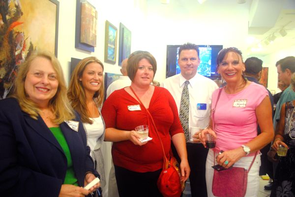 Karen Carlisle of Destination Events of the Palm Beaches, left, with Ross Cash of the Good Start Golf School, Alson Godin of Coffee on Call, Dennis Farrar of New York Life Insurance Co. and Jacquelyn Hanser of Coffee on Call. 