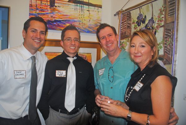 Stephen P. Orchard of the Orchard Law Group, left, with Robert Hickok of the Hickok Law Firm, Terry McCullagh of TMR Technology and Angela McCullagh. 