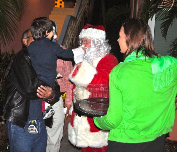 Yes the beard's real, Santa seems to be telling this young chamber member! 