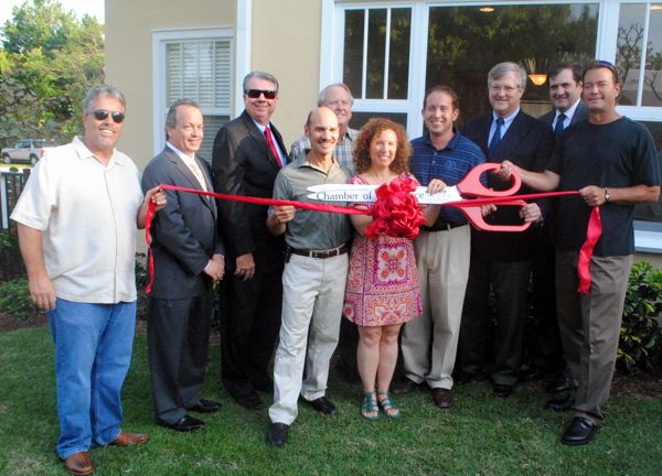 Jordan and Benita Goldstein open the Historic Hartman House bread and breakfast Wednesday with the help of the Delray Beach Chamber of Commerce and city officials