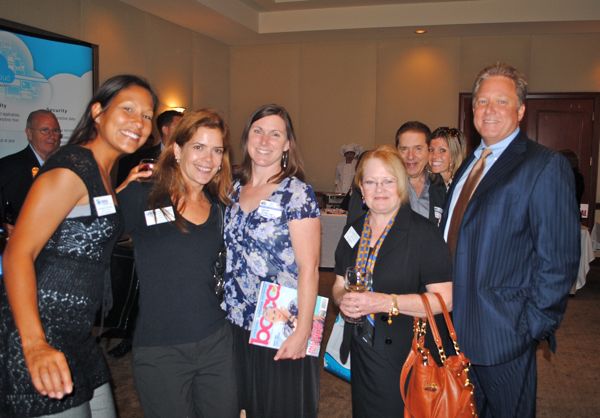 Michelle Morales and Gina Graves of Habitat for Humanity of South Palm Beach County, Diana Hileman a lawyer with Rutherford Mulhall P.A., Suzen Robeson of Chase Bank and Ronald Thompson of Thomson Promotions. Smiling at the rear, right is Jen Sommers of Reach Local. 