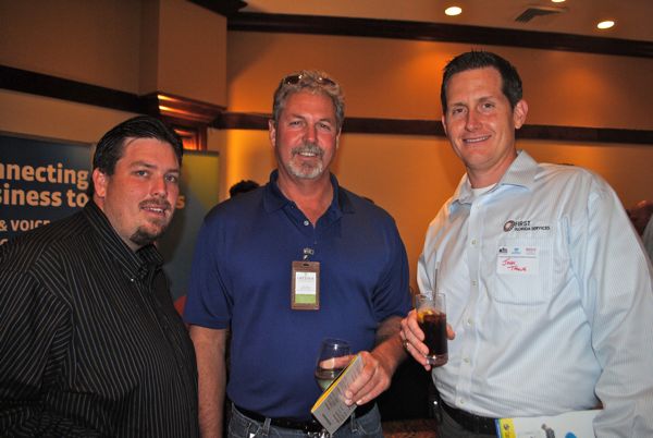 Kenny Rickett of Greener Landscape Services, center, with John W. Tague of First Florida Services. The gentleman at the left is with Hydro Solutions in Jupiter. 