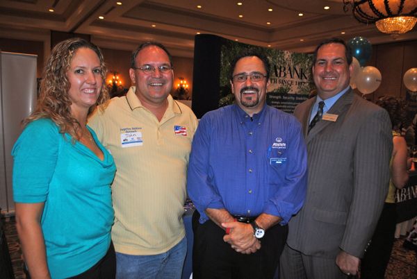 Lisa Minns of Zavee, with John Oldham of the Forgotten Soldiers Outreach, Charles Maurer of AllState Insurance and David Lumbert of Iberiabank.