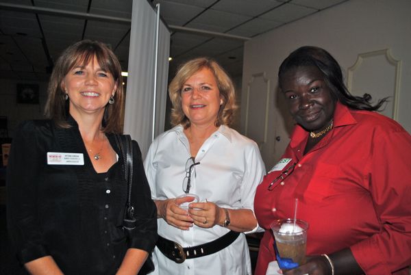 Victoria Cordova of Number Cruncherz, left, with Patti Lydon o Health Intelligence and Valerie of the Envy Nail Bar. 