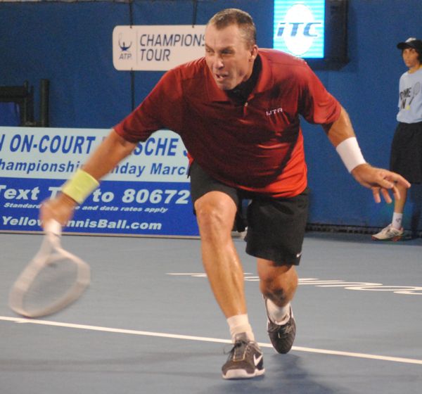 Ivan Lendl reaches for a shot in his match against Mikael Pernsfor. 
