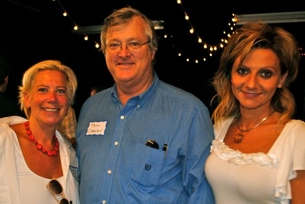 Christina Lodar of the Legacy, with City Commissioner Tom Carney and Aylona Aleksandra Ushe of The Arts Gargage. 