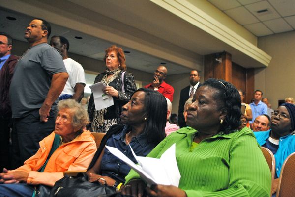 Delray Beach residents wait for their turn to speak out against the proposed fire service fee Tuesday evening. 
