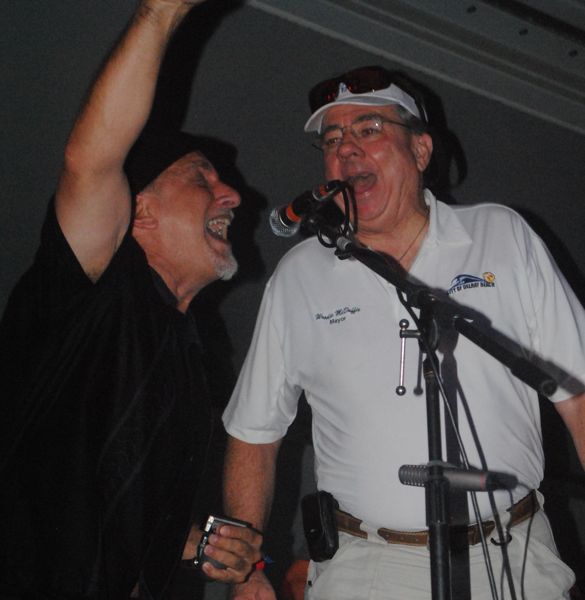 Delray Beach Mayor Woodie McDuffie gets down with 'Jumpin' Jack' Bluni of the Big City Blues Band. 