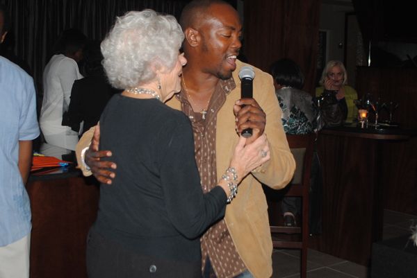 Eileen Bushman dances with Roger George. 