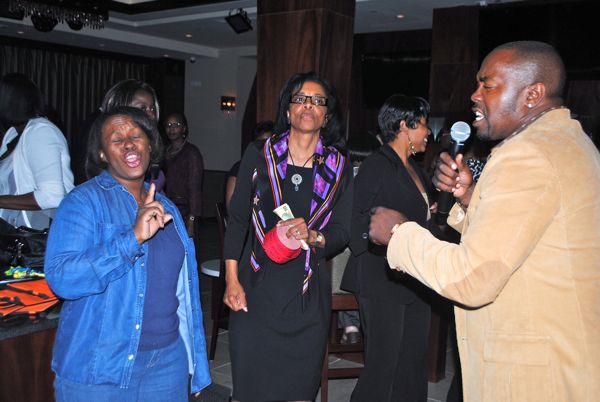 Jillian McBride of Primerica, left, with Victoria Hughes of the TED Center and Roger George of Voices Entertainment. 