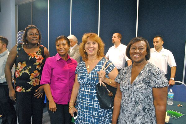 Jeanette Washington of Hub International Northeast, left, with Julie Hector, owner of Discovery Business Services, Luz Mujica, also with Discovery Business, and Jillian McBride of Primerica. 