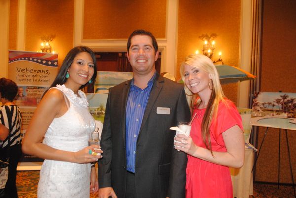 Chelsea Arnold, left, with Josh Rabine and Christina Madrigal, all of Randstad in Boca Raton. 