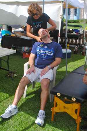 Dr. Marilyn Shore gives a chiropratic adjustment to Todd Soobodkin. 