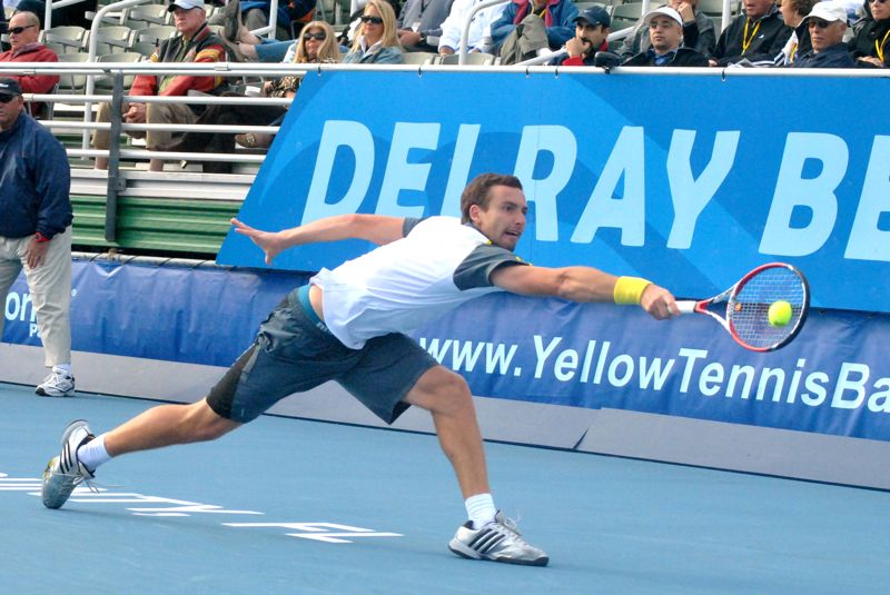Ernests Gulbis reaches for a shot in his match Saturday against Tommy Haas.